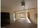 Cozy living room with tiled floors and a light fixture, perfect for relaxation and entertaining guests at 4310 N 42Nd Pl, Phoenix, AZ 85018