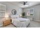 Serene bedroom with a king bed, neutral tones, and ample natural light through shuttered windows at 4438 N 27Th St # 27, Phoenix, AZ 85016