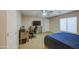 Spacious bedroom with room for a home office setup and comfortable bed at 46057 W Dutchman Dr, Maricopa, AZ 85139
