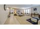 Spacious living room featuring neutral paint, carpet, and elegant furnishings at 46057 W Dutchman Dr, Maricopa, AZ 85139