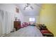 Spacious bedroom with gray flooring, complemented by light walls and filled with natural light at 4727 N 50Th Dr, Phoenix, AZ 85031