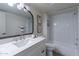 Well-lit bathroom with a modern vanity, large mirror, and stylish shower with herringbone tile at 4901 S Calle Los Cerros Dr # 237, Tempe, AZ 85282
