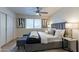 Stylish bedroom offers a ceiling fan and a large window at 4901 S Calle Los Cerros Dr # 237, Tempe, AZ 85282