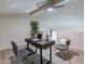 Cozy office space featuring a ceiling fan, a desk with a laptop, and seating for two people at 4901 S Calle Los Cerros Dr # 237, Tempe, AZ 85282