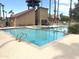Beautiful community pool area with a hot tub, lounge chairs, and shade at 4901 S Calle Los Cerros Dr # 237, Tempe, AZ 85282