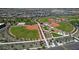 Aerial view showcasing a community park with baseball fields and a playground at 5223 S Axiom --, Mesa, AZ 85212