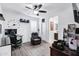 Bedroom with a ceiling fan, workstation, and reading chair, perfect for relaxing or working at 5223 S Axiom --, Mesa, AZ 85212