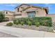 Two-story home featuring a low-maintenance desert landscape and a well-kept yard at 5223 S Axiom --, Mesa, AZ 85212