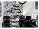 Chic home office with patterned wallpaper, shelving, and modern décor at 5223 S Axiom --, Mesa, AZ 85212