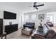 Bright and spacious living room featuring hardwood floors and modern decor at 5223 S Axiom --, Mesa, AZ 85212