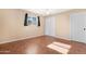 Bedroom featuring sleek tile flooring and a closet at 612 N Recker Rd, Mesa, AZ 85205