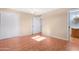 Bedroom with closet and bathroom access, featuring sleek tile flooring at 612 N Recker Rd, Mesa, AZ 85205
