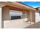 A close-up of the front porch with security door at 612 N Recker Rd, Mesa, AZ 85205