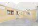 Bright living room with light-colored walls and tiled floors at 612 N Recker Rd, Mesa, AZ 85205
