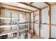 Interior view of a shed featuring shelving and an assortment of storage items at 612 N Recker Rd, Mesa, AZ 85205