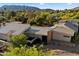 Beautiful exterior elevation showcasing unique roofline, desert landscape, and mountain views at 6417 N 52Nd Pl, Paradise Valley, AZ 85253