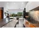Well-appointed kitchen features modern appliances, sleek countertops, and ample cabinet space at 6417 N 52Nd Pl, Paradise Valley, AZ 85253