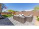 Landscaped backyard featuring lounge seating, a playground, and pavers at 6422 W Brookhart Way, Phoenix, AZ 85083