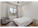 Bedroom featuring neutral decor, a plush chair, and natural light at 6422 W Brookhart Way, Phoenix, AZ 85083