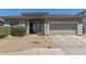 Charming single-story home featuring a well-manicured front yard and a two-car garage at 6422 W Brookhart Way, Phoenix, AZ 85083