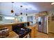 Well-equipped kitchen features stainless steel appliances and ample counter space at 6901 E Portland St, Scottsdale, AZ 85257