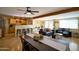 Open concept kitchen and living area with modern amenities and comfortable seating at 6901 E Portland St, Scottsdale, AZ 85257
