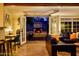 Cozy living room with fireplace view to the outdoors at 6901 E Portland St, Scottsdale, AZ 85257