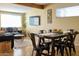 Open concept living and dining area with modern lighting and comfortable seating at 6901 E Portland St, Scottsdale, AZ 85257