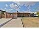 Expansive backyard with a covered patio, perfect for outdoor entertaining and relaxation with ample space at 7125 W Canterbury Dr, Peoria, AZ 85345