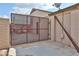Secure gated area with metal screen and block wall providing added privacy and security at 7125 W Canterbury Dr, Peoria, AZ 85345