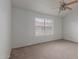 Spacious bedroom with a ceiling fan and ample natural light, offering a comfortable and airy space at 7977 W Wacker Rd # 253, Peoria, AZ 85381