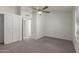 Bedroom featuring carpet flooring, a ceiling fan, and a closet for storage at 7977 W Wacker Rd # 253, Peoria, AZ 85381