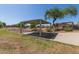 Community picnic area with a shaded structure, table, and desert landscaping at 7977 W Wacker Rd # 253, Peoria, AZ 85381