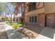 Charming townhome exterior showcasing well-maintained landscaping and convenient front access at 7977 W Wacker Rd # 253, Peoria, AZ 85381
