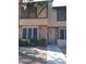Charming townhome featuring a brick facade, well-maintained landscaping, and a welcoming entryway at 7977 W Wacker Rd # 253, Peoria, AZ 85381