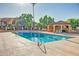Tranquil community pool with a shaded seating area, perfect for relaxation and socializing at 7977 W Wacker Rd # 253, Peoria, AZ 85381
