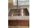 Close-up of a stainless steel kitchen sink with a modern faucet and granite countertop at 7977 W Wacker Rd # 253, Peoria, AZ 85381