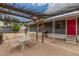 Spacious covered patio with outdoor seating area, perfect for relaxing and entertaining at 8107 E Butte St, Mesa, AZ 85207