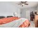 Functional bedroom with closet and bed, and neutral walls at 8107 E Butte St, Mesa, AZ 85207