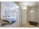 Inviting entryway with tile flooring leading to a well-lit bedroom with a ceiling fan at 8261 E Keats Ave # 396, Mesa, AZ 85209