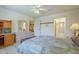 Main bedroom features tile flooring, ceiling fan, with en-suite bathroom and walk-in closet at 8261 E Keats Ave # 396, Mesa, AZ 85209