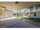 Covered patio with courtyard view and plastic chairs at 8261 E Keats Ave # 396, Mesa, AZ 85209
