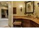 Well-appointed bathroom featuring marble countertop and custom vanity for a luxurious and functional space at 9290 E Thompson Peak Pkwy # 409, Scottsdale, AZ 85255