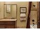 Bathroom featuring custom vanity and bathtub and shower combo and decorated for optimal luxury at 9290 E Thompson Peak Pkwy # 409, Scottsdale, AZ 85255