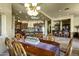 Dining room with ornate table and views into other living spaces at 9290 E Thompson Peak Pkwy # 409, Scottsdale, AZ 85255
