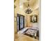 Grand foyer featuring decorative tile floor, detailed iron door, and a lovely niche for displaying decor at 9290 E Thompson Peak Pkwy # 409, Scottsdale, AZ 85255