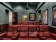 Spacious home theater featuring comfortable seating, a projector, and a dark room for an immersive experience at 9290 E Thompson Peak Pkwy # 409, Scottsdale, AZ 85255