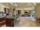 Spacious open-concept kitchen with a large island, bar seating, and seamless transition to living area at 9290 E Thompson Peak Pkwy # 409, Scottsdale, AZ 85255