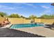 Inviting swimming pool and spa with a large patio area for lounging at 9290 E Thompson Peak Pkwy # 409, Scottsdale, AZ 85255