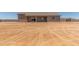 Backyard of single-story home featuring an open patio, concrete foundation, and block fence at 9485 W Sandstone Mountain Dr, Casa Grande, AZ 85194